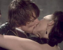 Goneril kissing Edmund